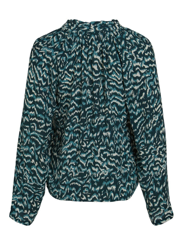 camisa animal print turquesas