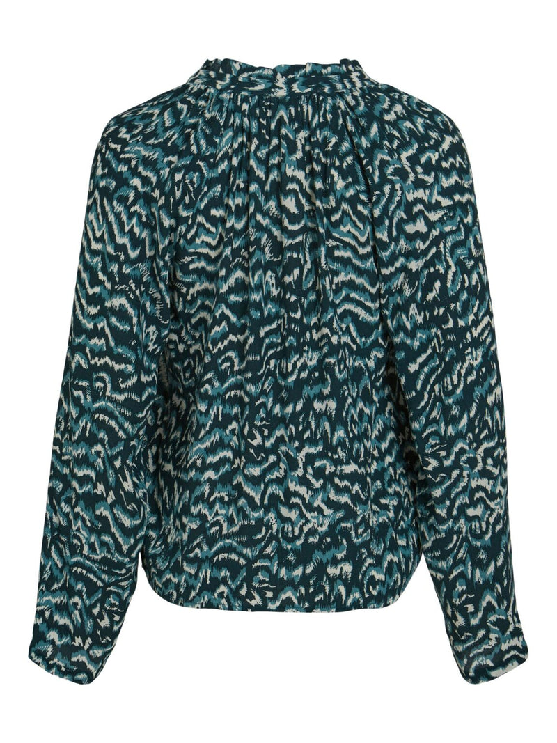camisa animal print turquesas