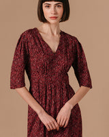 vestido estampado tonos rojos elastico cintura