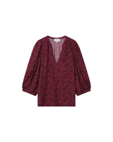 camisa estampada tonos rojos escote pico