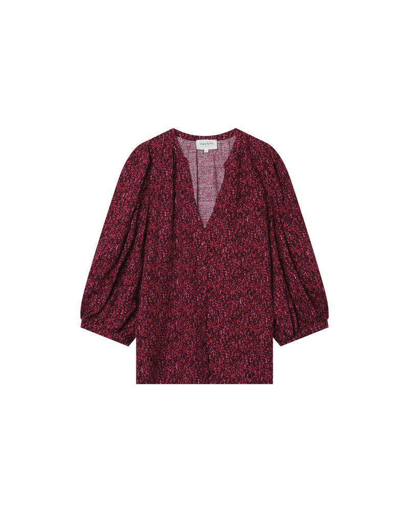 camisa estampada tonos rojos escote pico