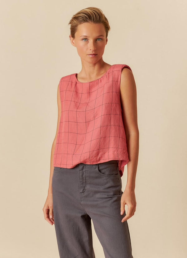 camisa abotonada atras sin mangas