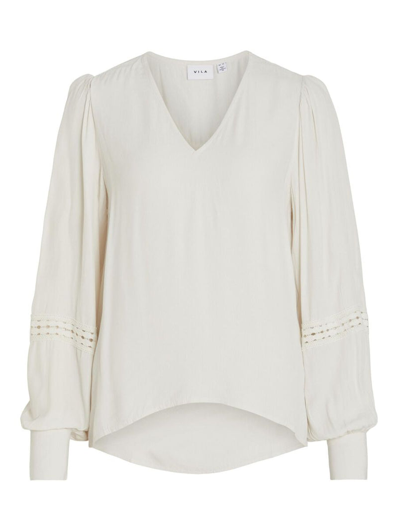Camisa cuello pico manga larga,franja tira bordada