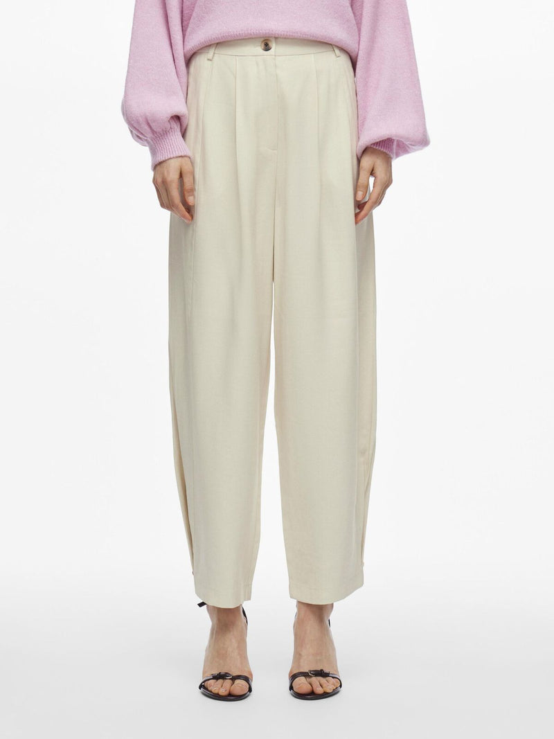 pantalon crudo globo con boton abajo