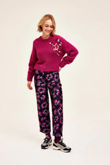 pantalon negro flores estrelladas fluor fosfo