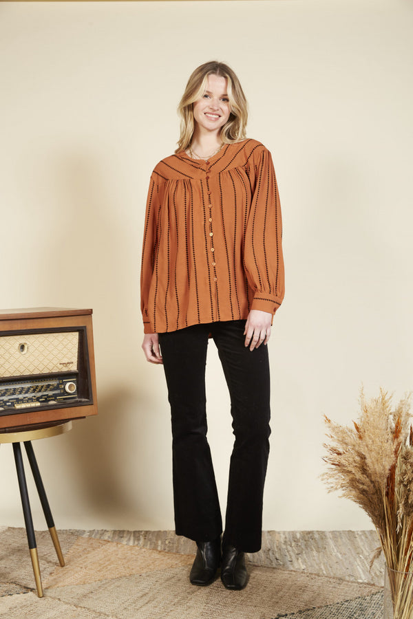 Camisa camel multiboton visto