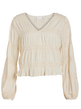 CAMISA CRUDA CENEFAS MARGARITAS BORDADAS